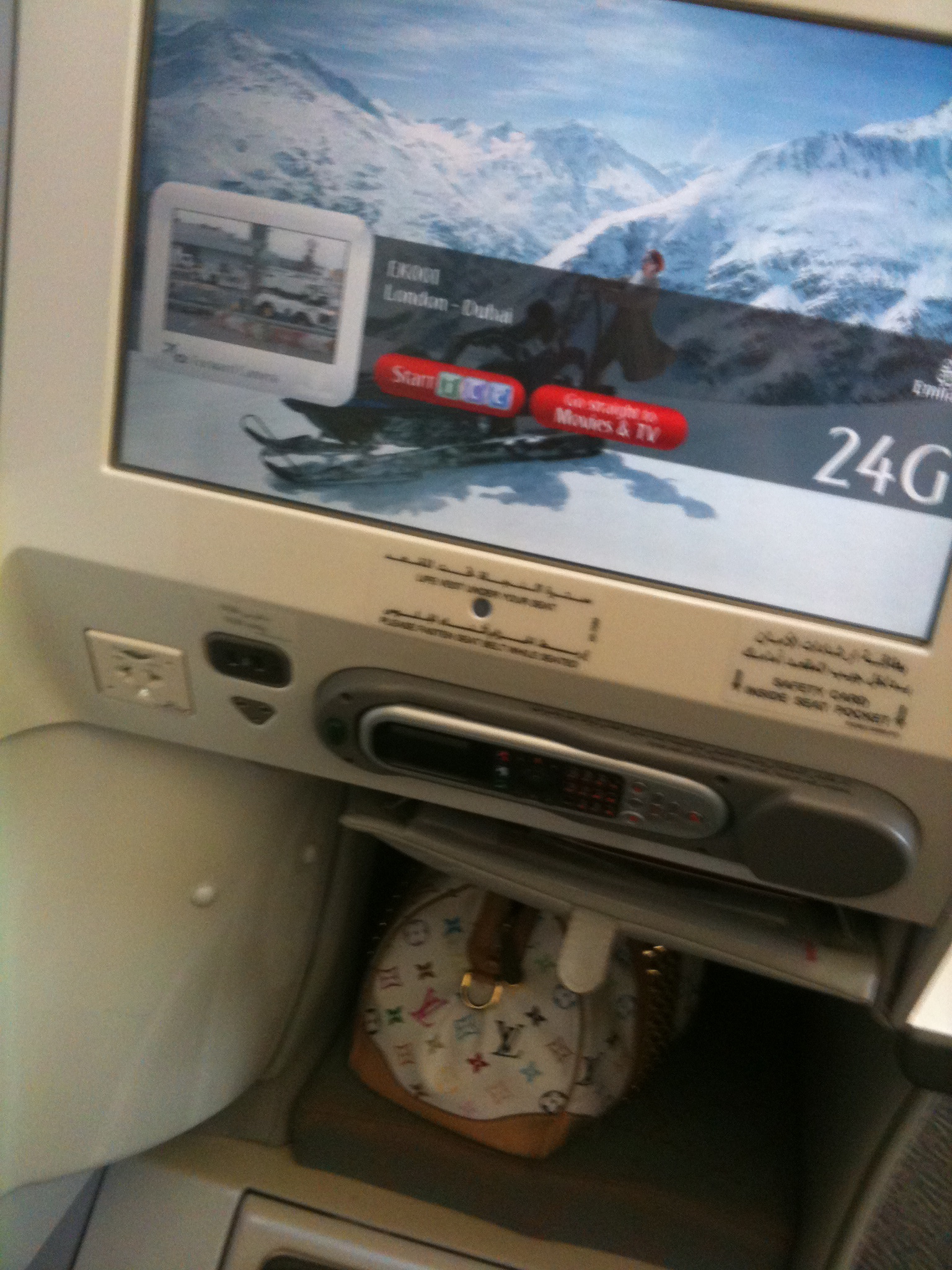 emirates A380 business class tv and foot rest